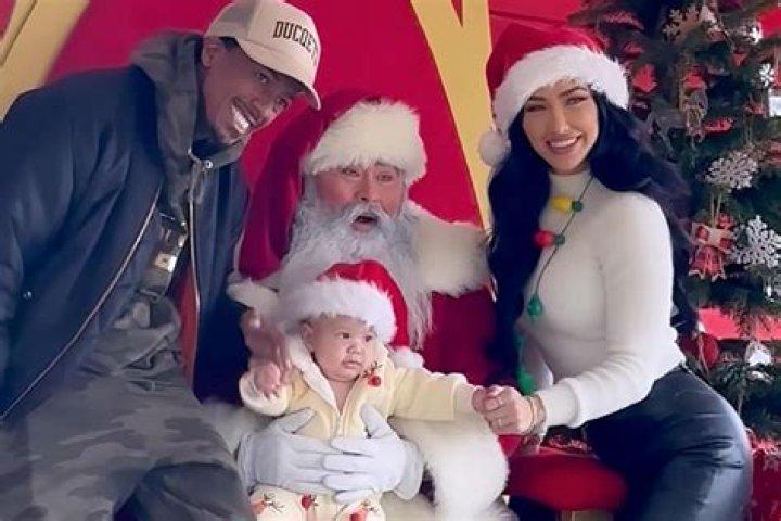Bre Tiesi gets called 'the chosen one' after locking lips with Nick Cannon in stunning Christmas car
